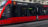 Ein rotes Tram mit der Aufschrift "Immer & Ewig" und dem Logo des SC Bern.